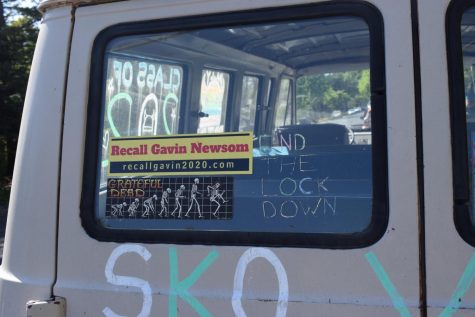 VAN VIEWPOINT. A bumper sticker that declares “Recall Gavin Newsom” is displayed on the van of a Palo High School student. Photo by Anya Lassila.
