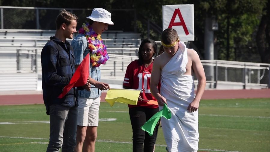 Four 2019 Paly students dress up for Salad Dressing Day. From left to right: Cowboys, Thousand Island, Sports Wear, and Togas. Photo by Ethan Chen.