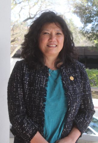 Mayor Lydia Kou poses for an official photo. Kou has served as the mayor of Palo Alto since January 2023. Kous passionate initatives range from environmental impact to the youth and elderly population of Palo Alto. Kou sees her work as mayor as a way to take care of her community. “This is where we play, this is where we live, this is our home.”