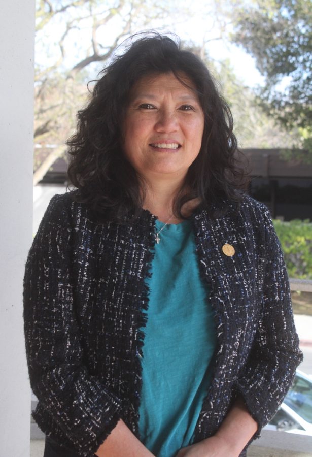 Mayor Lydia Kou poses for an official photo. Kou has served as the mayor of Palo Alto since January 2023. Kou's passionate initatives range from environmental impact to the youth and elderly population of Palo Alto. Kou sees her work as mayor as a way to take care of her community. “This is where we play, this is where we live, this is our home.”