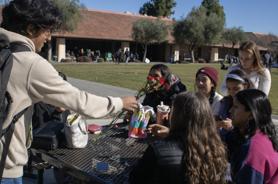 Flowers for Palo Alto club co-president senior Yash Shetty hands out flowers across campus to students and faculty to ease school stress. “It’s really nice when I get flowers. I get a feeling that people appreciate me and stuff like that, so I think, definitely, that everybody deserves to be given a flower,” co-president Jonas Pao said.