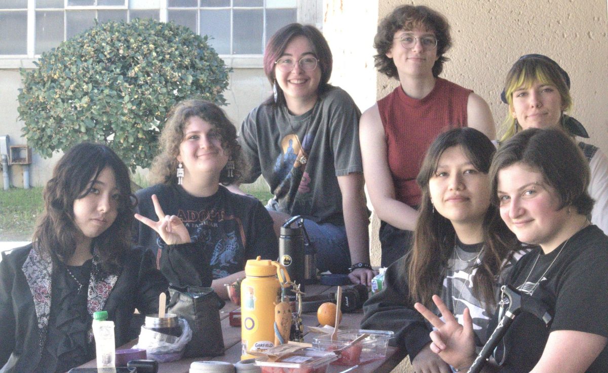 PETITION MEETING. Outside of classroom 807, the Accessibility and Inclusion Society of Palo Alto club meets during lunch for its weekly meeting on Tuesday. The club discussed plans to petition a repeal of the no-phone policy in wellness at the next PAUSD board meeting.