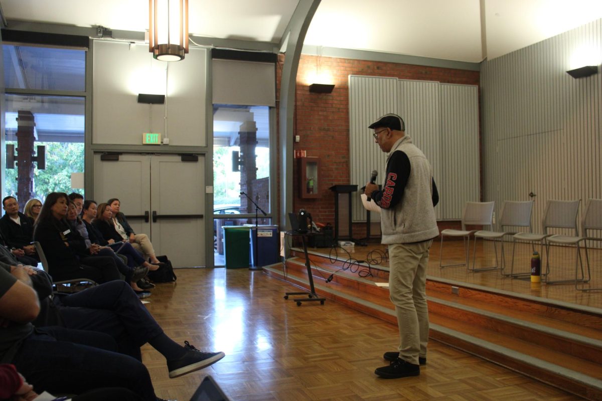 Shashank Joshi, a Stanford professor of psychiatry, speaks at the Palo Alto Art Center during a town hall meeting about protecting youth mental health in the face of pending budget cuts. “This is the time when we have to absolutely be creative and prioritize finding ways to continue to finance allcove,” Joshi said. 