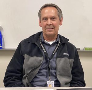 Retiring Palo Alto Adult School Principal Jim Sherman shares experiences from his career during an interview in his office in January. Sherman is one of two Palo Alto Unified School District principals retiring at the end of this year. "All of the people I've worked with here are wonderful, so I'll miss them, that's for sure," Sherman said.