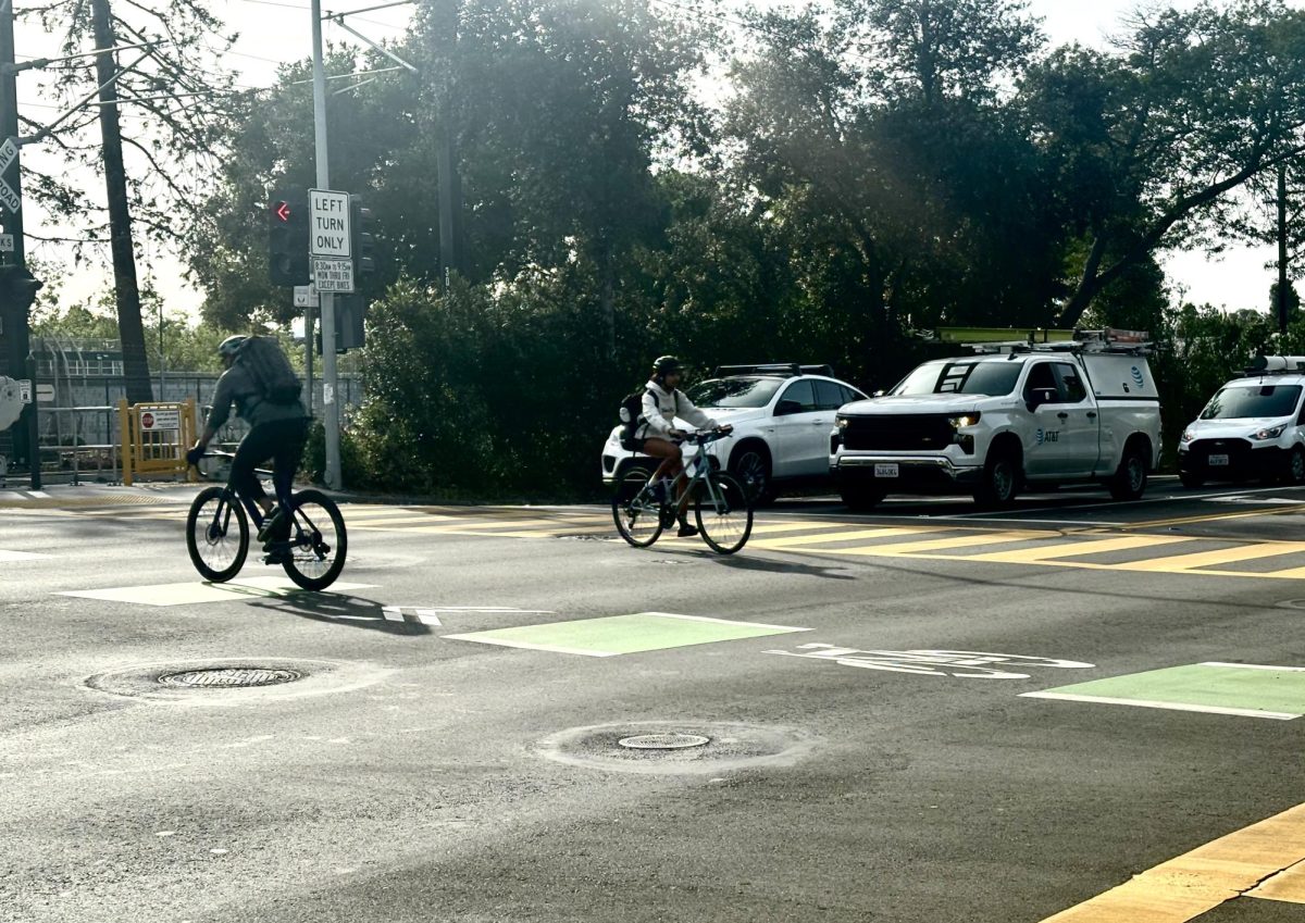 Students cross street on Churchill Ave. Several safety measures have been placed around the intersection, including the addition of security guards at all Caltrain
crossings in Palo Alto, which, according to City Council member Julie Lythcott-Haims, was highly requested. “This follows a ground swell of public opinion
that a human presence at the train tracks would be an important deterrent to the use of lethal means,” Lythcott-Haims said.