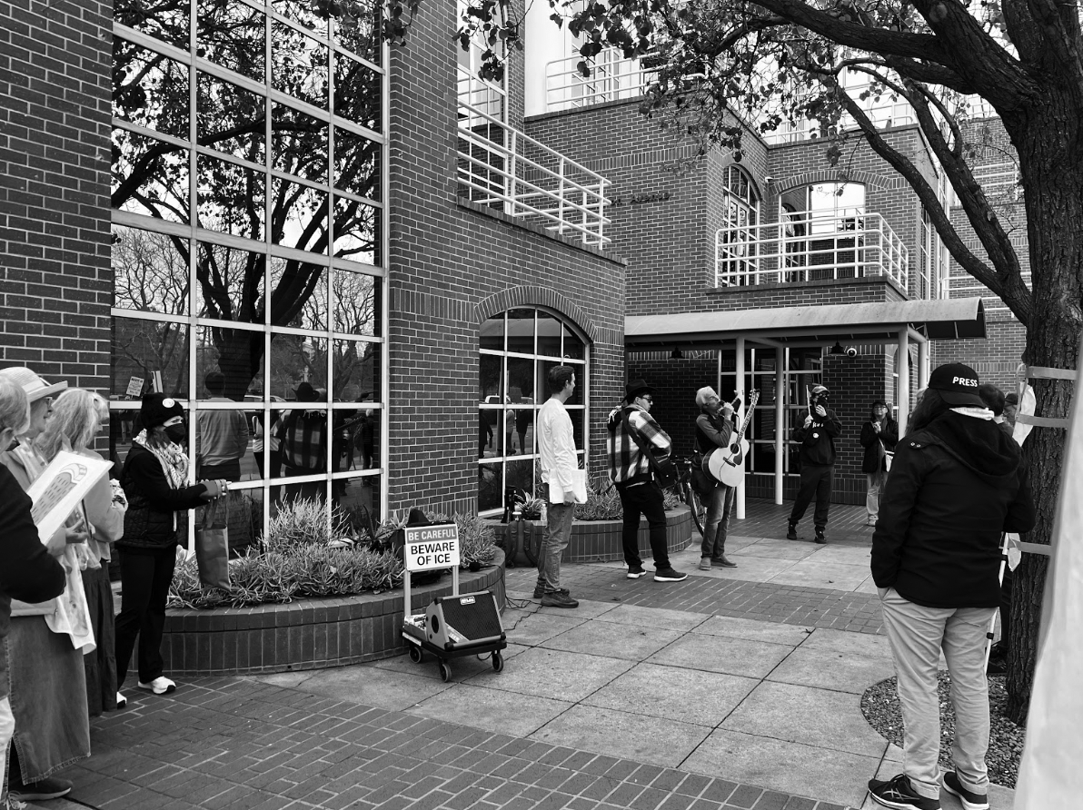 Singing in protest - Protestors gather in front of the Palantir office to protest their partnership with U.S. Immigration and Customs Enforcement.